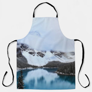 LAKE NEAR SNOW COVERED MOUNTAIN DURING DAYTIME APRON