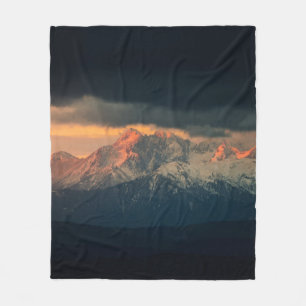 LANDSCAPE PHOTOGRAPHY OF SNOW MOUNTAINS UNDER NIMB FLEECE BLANKET
