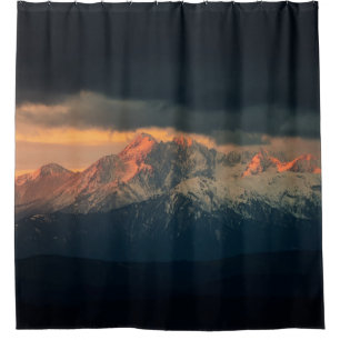 LANDSCAPE PHOTOGRAPHY OF SNOW MOUNTAINS UNDER NIMB SHOWER CURTAIN