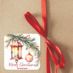 Lantern with Pine and Holly Berries Christmas Square Sticker<br><div class="desc">This customisable Christmas sticker features a charming watercolor design that beautifully captures the holiday spirit. At the centre, an antique-style lantern emits a warm, inviting glow, creating a cosy atmosphere. The lantern is adorned with a sprig of pine and delicate holly berries, adding a touch of natural elegance. The text...</div>