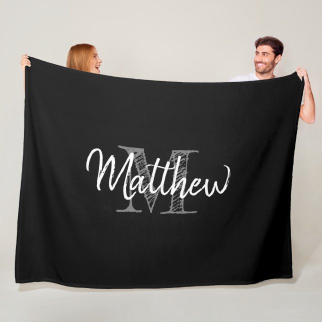 Large black and white fleece blanket with monogram (In Situ)