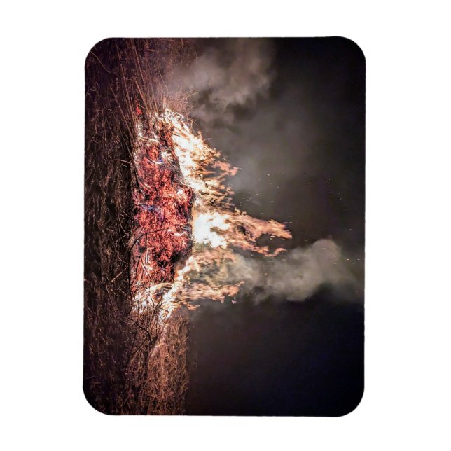 Large bonfire burning at night with high flames magnet (Vertical)