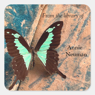Large butterfly on old book textures square sticker