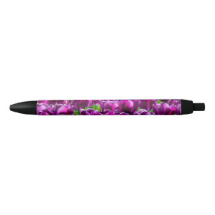 Large field of purple tulips black ink pen