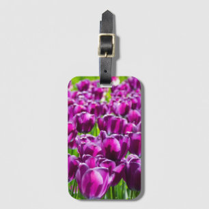 Large field of purple tulips   luggage tag