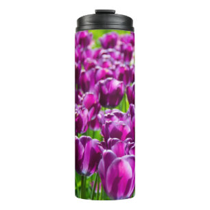 Large field of purple tulips thermal tumbler