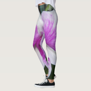 large graphic of a purple and white orchid leggings