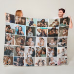 Large Modern 30-Photo Collage Fleece Blanket<br><div class="desc">This custom photo collage blanket design features a modern and heartwarming layout with a clean grid style that beautifully showcases cherished family memories. The seamless arrangement of photos creates a cosy and inviting look, perfect for highlighting special moments and celebrating meaningful connections. Ideal gift for birthdays, holidays, anniversaries, or special...</div>
