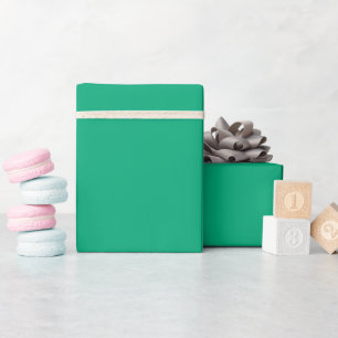 large teal-green, folder-like polygon wrapping paper