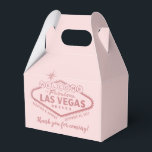 Las Vegas Party Hangover Recovery Kit Favour Favour Box<br><div class="desc">Personalised welcome to fabulous Las Vegas light sign in faux rose gold blush pink foil gable box with custom wording on the back for creating a hangover helper welcome kit for guests at your destination wedding. The boxes are nice and small, perfect for holding some pain reliever, hydration powders, B...</div>