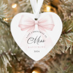 Last Christmas as a Miss Heart Ornament<br><div class="desc">Celebrate your final Christmas as a Miss with this elegant, minimalistic heart ornament. Featuring a chic pink bow and sophisticated fonts, this ornament is perfect for brides-to-be as they prepare for their next chapter. Hang it proudly on your tree as a beautiful reminder of your engagement season and the magical...</div>