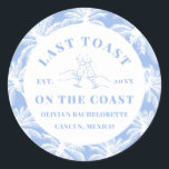 Last Toast On The Coast Beach Coastal Bachelorette Classic Round Sticker<br><div class="desc">Introducing our "Last Toast On The Coast" Beach Coastal Bachelorette Sticker, the perfect accent for your seaside celebration! These stickers feature a charming coastal-inspired design, setting the tone for a memorable beach bachelorette party. With their durable adhesive backing, they can be easily applied to party favours, decorations, and more, adding...</div>