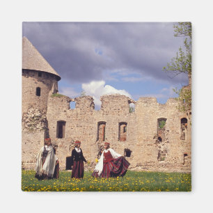 Latvian girls in traditional dress, singing magnet