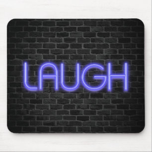LAUGH text in neon lights on brick Mouse Pad