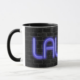 LAUGH text in neon lights on brick Mug