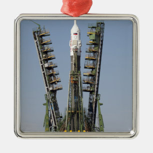 Launch scaffolding is raised into place metal ornament