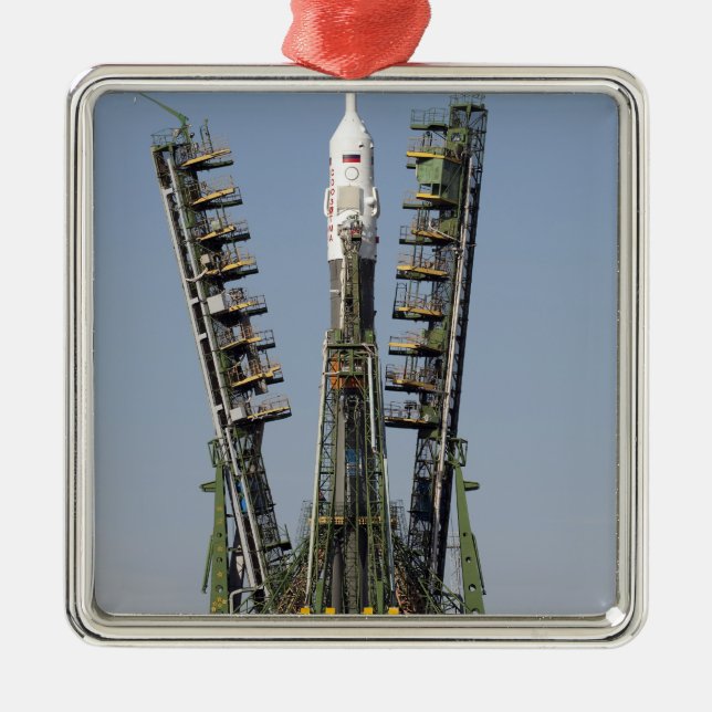 Launch scaffolding is raised into place metal ornament (Front)