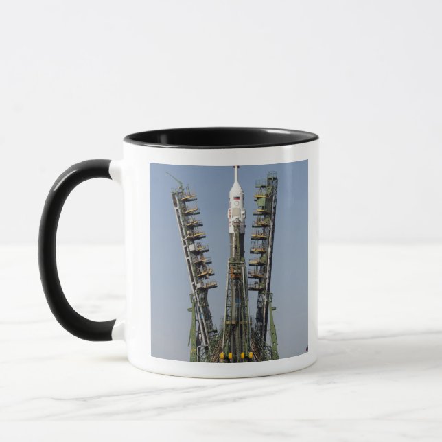Launch scaffolding is raised into place mug (Left)