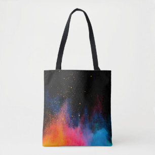 Launched colourful powder, isolated on black backg tote bag