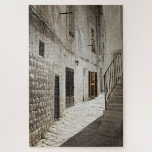 Laundry hanging to dry in an alley in Italy Jigsaw Puzzle