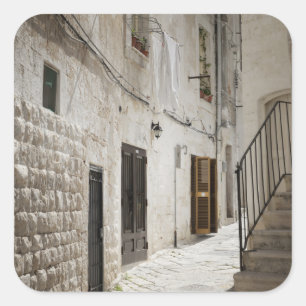 Laundry hanging to dry in an alley in Italy Square Sticker