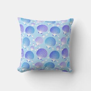 Lavender and blue seashells on pale blue cushion