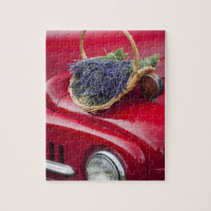 Lavender bunches rest on old farm pickup truck jigsaw puzzle