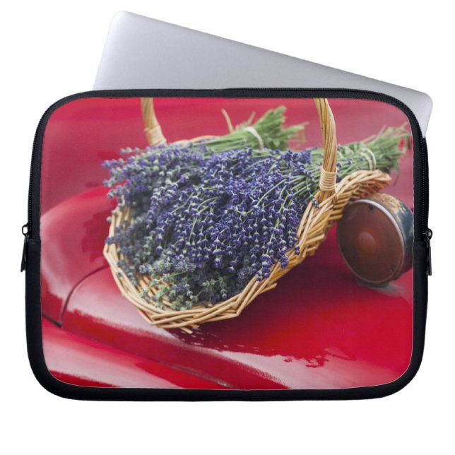 Lavender bunches rest on old farm pickup truck laptop sleeve (Front)