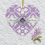 Lavender Lily Damask Wedding Memento Ceramic Ornament<br><div class="desc">A heart-shaped wedding keepsake ornament in a lavender damask floral motif adorned with a white lily pattern from the Art Nouveau period. What truly sets this ornament apart is the subtle touch of sparkle with a faux amethyst gemstone and silver ribbon. Add your names to the front and on the...</div>