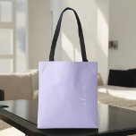 Lavender Purple Girly Script Monogram Modern Tote Bag<br><div class="desc">Lavender Purple Elegant Add Your Own Name Monogram Book Bag. This Book Bag can be customised to include your initial and first name and given as a gift for Christmas,  Sweet 16 Birthday,  Bridal Shower or a Wedding.</div>