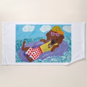 Lazy Dachshund on a Float Beach Towel