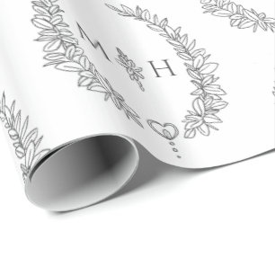 Leaf oval monogram drawing dark grey on white wrapping paper