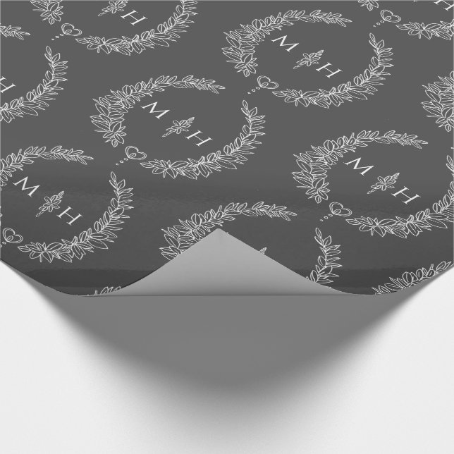 Leaf oval monogram drawing dark grey on white wrapping paper (Corner)