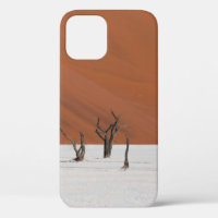 LEAFLESS TREE ON WHITE SNOW COVERED GROUND DURING 