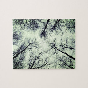 Leafless treetops against sky jigsaw puzzle
