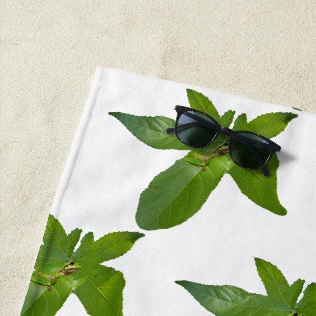 "Leafy Haven: A Small Green Frog on a Grape Leaf" Beach Towel (In Situ)