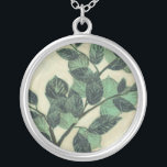 Leaves and Branches on Cream Background Silver Plated Necklace<br><div class="desc">Vibrant green leaves and branches rest on a cream background in this print by Jennifer Goldberger. As the season change the colours on these leaves stay the same,  bringing a little consistency into your life.</div>