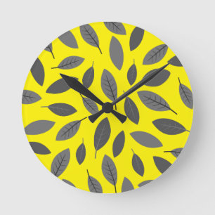 Leaves Over Yellow Round Clock