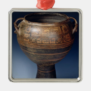 Lebes decorated with a geometric pattern metal ornament