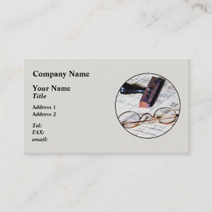 Ledger With Eyeglasses and Rubber Stamp Business Card