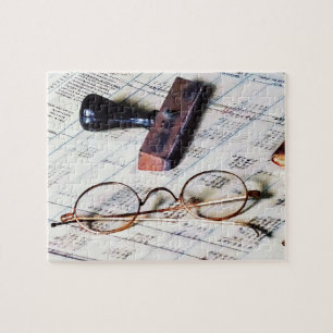 Ledger With Eyeglasses and Rubber Stamp Jigsaw Puzzle