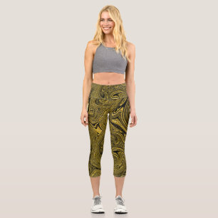 Leggings With Gold Accents and Black Background