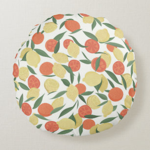 Lemon and orange fruits with leaves on white backg round cushion