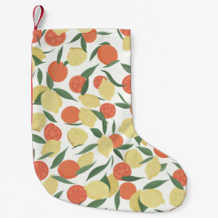 Lemon and orange fruits with leaves on white backg small christmas stocking