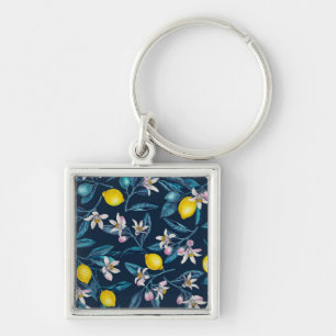 Lemon branches with blossoms and fruit on blue key ring