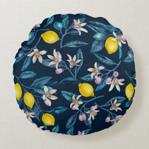 Lemon branches with blossoms and fruit on blue round cushion