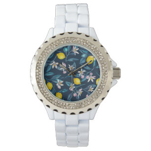 Lemon branches with blossoms and fruit on blue watch