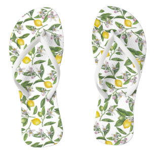 Lemon branches with blossoms and fruit on white thongs