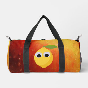 Lemon, fruit with googly eyes and apple duffle bag