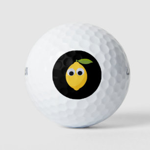 Lemon, sweet fruit with googly eyes golf balls